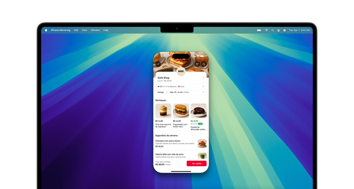 MacBook Pro com chip M4 mostrando o Espelhamento do iPhone e o app DoorDash na tela.