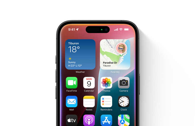 Ein farbiges, glühendes Licht ist gerade so erkennbar um den Rand eines iPhone Displays mit dem Homescreen