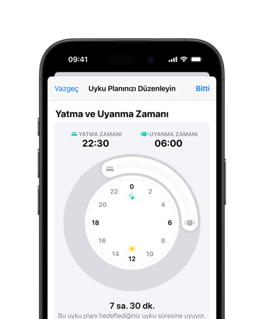 iPhone 16’nın önden görünümü, Kullanıcı Arayüzünde Sağlık uygulamasının, Yatma Zamanı, Açık Mod’da Yatma Zamanı Programı görülüyor