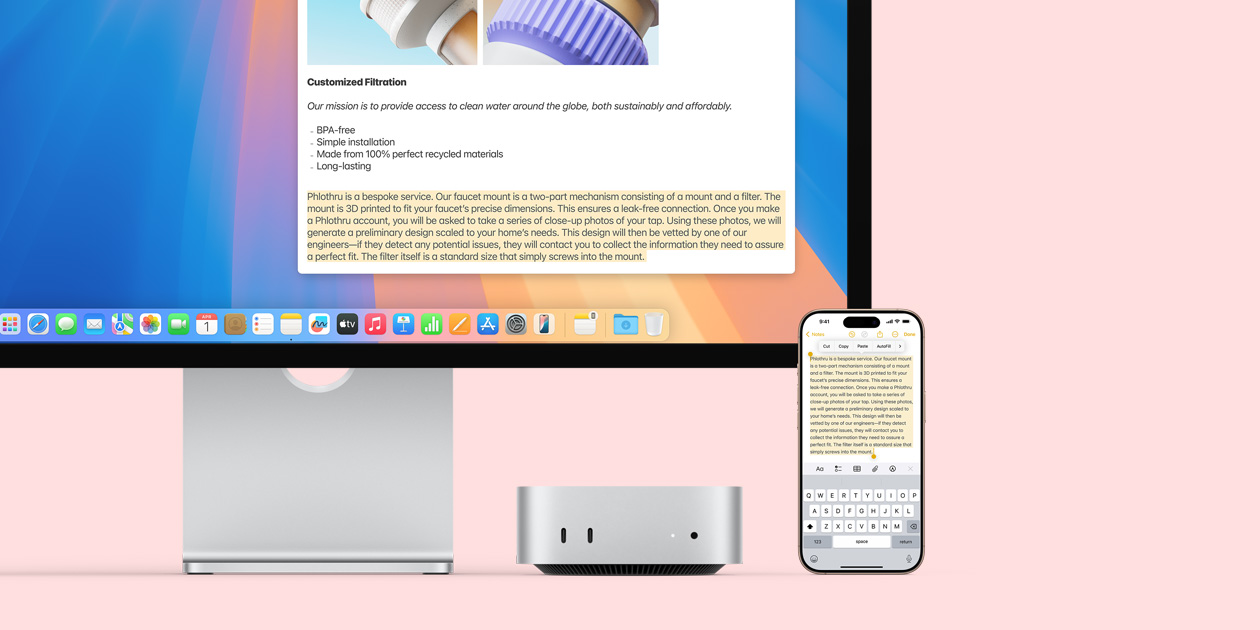 Mac 顯示器、銀色 Mac mini 和 iPhone 並排在一起,顯示器和 iPhone 螢幕上展示通用剪貼板功能,從一部 Apple 裝置拷貝內容再貼到另一部裝置