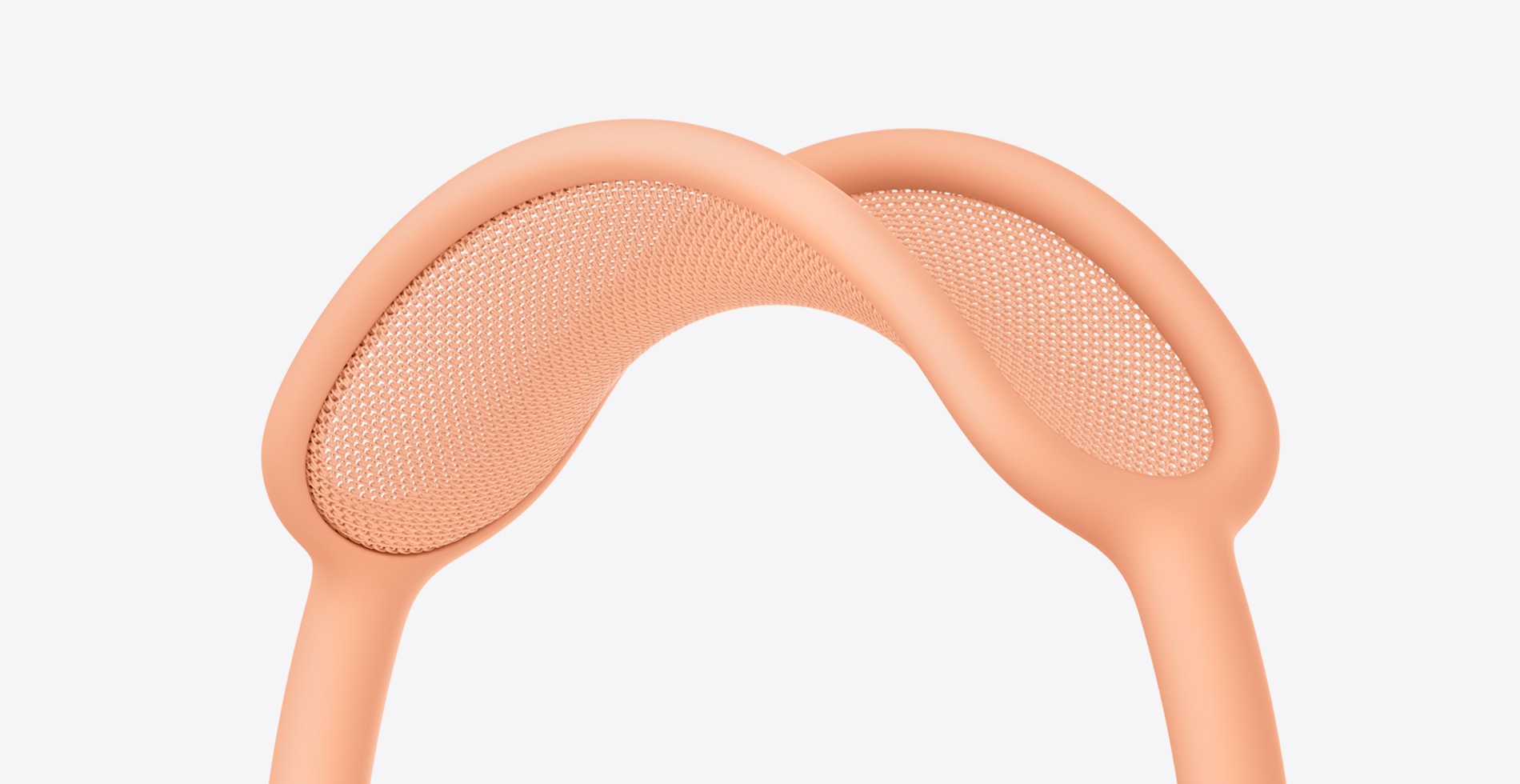 صورة مقربة للإطار المحيط بالرأس في AirPods Max باللون البرتقالي.