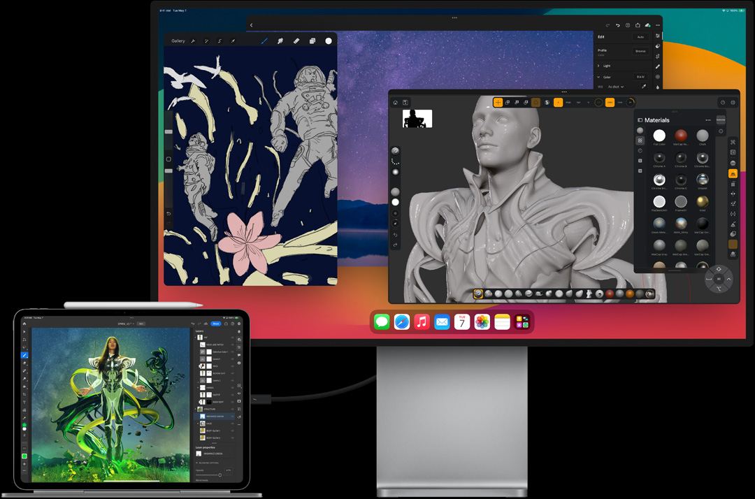iPad Pro w układzie poziomym z podłączoną klawiaturą Magic Keyboard i zewnętrznym wyświetlaczem, na obu ekranach widoczne obrazy w trakcie edycji